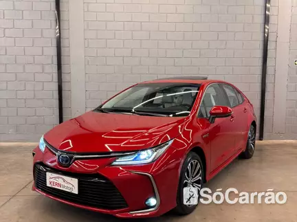 Toyota COROLLA ALTIS HYBRID(PREMIUM PACK) 1.8 VVT-I 16V CVT na cor Vermelha no Canoas / RS - 6917378